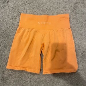 NVGTN sunset orange pro shorts